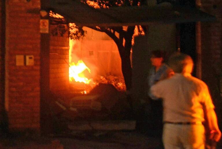 Argentina - incendio - curiosa - niños - minoridad - policía